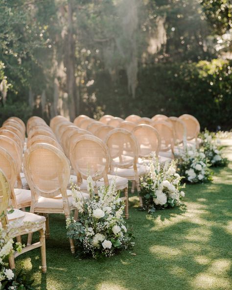 Magical moments from Colleen and Ryan’s stunning wedding! ✨ #designsbydillon Planning @bubblyeventsnc Photography @jaclynnolinphoto Videographer @willfryarweddings Venue @wrightsvillemanornc Rentals @partysuppliersandrentals @whitebirchrentals Catering @spoonfedkitchen Makeup @amykmua Hair @enmhair Green And White Wedding Flowers, Aisle Arrangements, White Larkspur, Lush Wedding, Modern Floral Design, White Carnation, Green Hydrangea, Wedding Ceremony Flowers, White Wedding Flowers