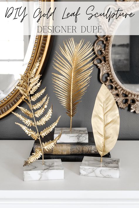 How to make a knock-off gold leaf sculpture using faux leaves, spray paint, scrap wood, and marble contact paper for a designer look for less. Diy Gold Leaf, Cheap Decor Ideas, Metallic Gold Spray Paint, Decoration For Wall, Leaf Sculpture, Hanging Leaf, Farmhouse Diy Projects, Dining Table Makeover, Home Styling Tips