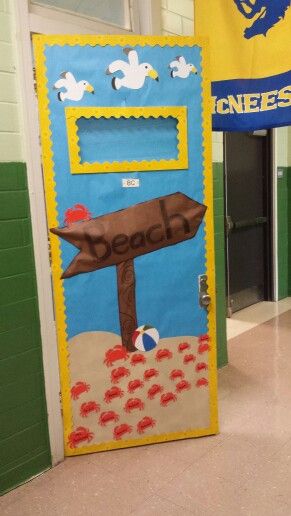 Beach themed classroom door with crabs and sea gulls Beach Theme Preschool Classroom, Beach Classroom Decorations, Beach Hallway Ideas School, Beach Classroom Door, Beach Classroom Door Ideas, Beach Theme Classroom Door, Beach Theme Door, Beach Themed Hallway Decor School, Beach Themed Classroom