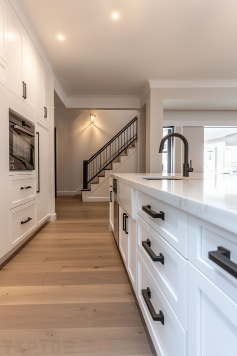 Kitchen Interior White And Black, White Kitchen Black Hardware Wood Accents, White Kitchen Cabinet Black Hardware, White Kitchen With White Walls, Black White Beige Kitchen, Oak Black And White Kitchen, Cream Kitchen Black Handles, Black Handles White Cabinets, Kitchens With Black Hardware