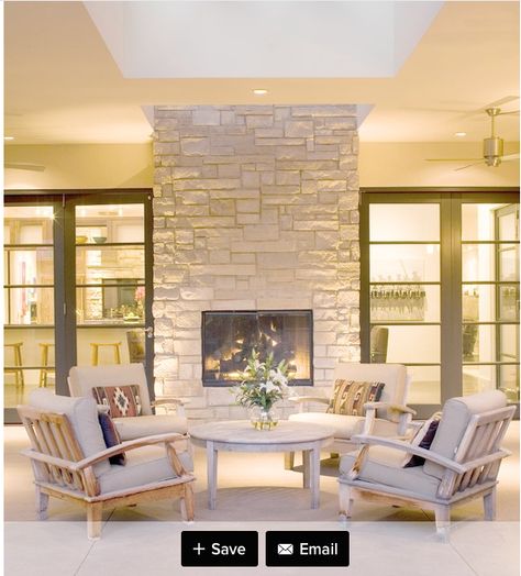 I like the doors on either side of the indoor/outdoor fireplace (don't like the stonework) White Stone Fireplaces, Indoor Outdoor Fireplaces, Modern Patio Design, Outdoor Fireplace Designs, Outdoor Fireplace Patio, Armoire Dressing, Double Sided Fireplace, Contemporary Patio, Patio Fireplace