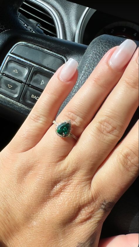 This stunning 1.8ct pear emerald engagement ring with diamond halo. Teardrop Emerald Engagement Ring, Emerald Ring Pear Shape, Emerald Engagement Ring Teardrop, Pear Emerald Ring, Pear Emerald Engagement Ring, Emerald Engagement Ring Pear, Emerald Ring Design, Green Engagement Rings, Pear Shaped Engagement Ring