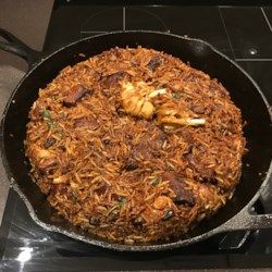 Uzbek Plov (Lamb and Rice Pilaf) - Allrecipes.com Uzbek Plov Recipe, Plov Recipe, Lamb And Rice, Rice Pilaf Recipe, Pilaf Recipe, Spiced Lamb, Middle Eastern Restaurant, Pilaf Recipes, Indian Rice Recipes