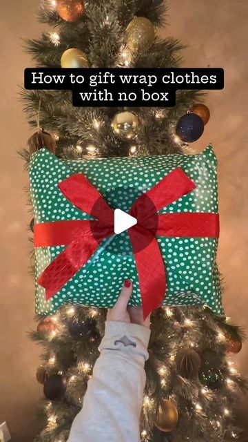 Nikki - Wrappin Queen | How to gift wrap clothes with no box #giftwrapping #giftwrappingideas #christmasgiftwrapping | Instagram How To Wrap A Jacket As A Gift, Gift Wrap Clothes, Wrap Clothes, Gifts Wrapping, How To Wrap, Gifts Wrapping Diy, Wrapping Gifts, Wrapping Ideas, Weighted Blanket