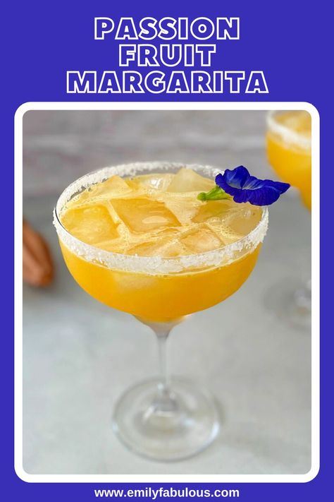 a passionfruit margarita with an edible flower garnish Passionfruit Margarita Recipe, Margarita Recipes Passion Fruit, Frozen Passion Fruit Margarita, Fruit Margarita Recipe, Spicy Passion Fruit Margarita, Passion Fruit Syrup Cocktails, Passion Fruit Margarita Recipe, Passionfruit Margarita, Passion Fruit Liqueur Cocktail