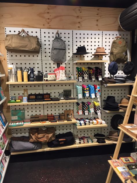 Campground Store Ideas, Outdoor Retail Store Design, Campground Business, Socks Display, Garage Store, Camp Store, Camping Gear Storage, Sock Display, Gear Wall