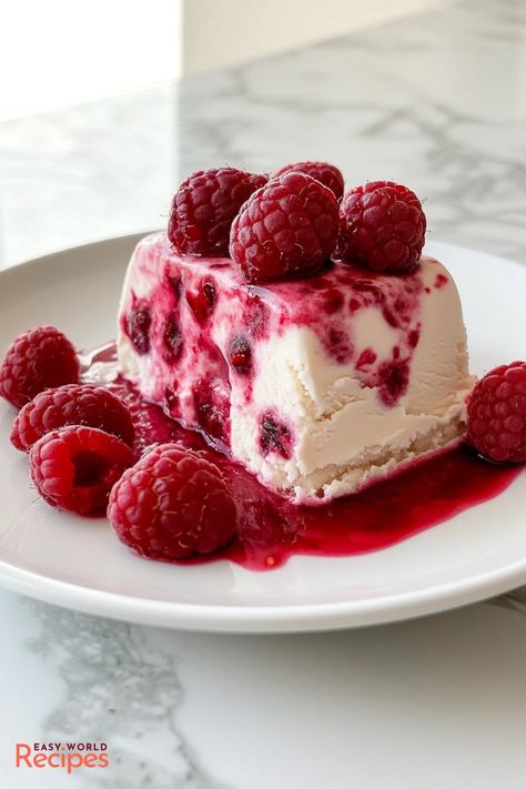 Italian Raspberry Semifreddo Recipe - EasyWorldRecipes Sophisticated Recipes, Frozen Berry Recipes, German Appetizers, Semifreddo Recipe, Italian Main Dishes, Italian Liqueur, Amaretti Cookies, Raspberry Coulis, Berry Recipes