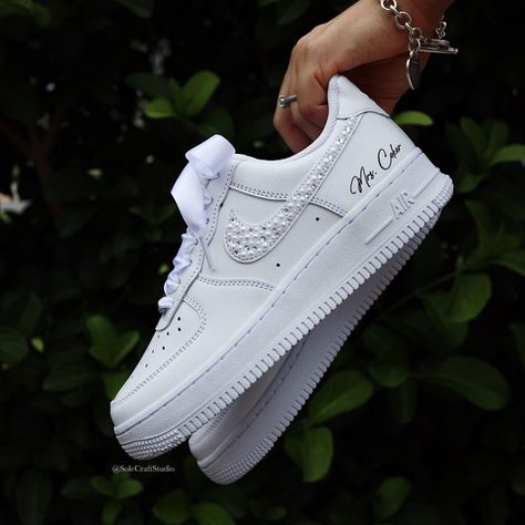 Make Your Day Extra Special With These Beautiful And Unique Custom Bridal Sneakers. Please Visit: Solecraftstudio.Com For A Better Customization Experience, And Better Prices. Brand New 100% Authentic Nike Air Force 1 Low With Box! Free Shipping Within The Us Territory! Rhinestones/Pearls Swoosh Bridal Custom Made-To-Order Sneaker. Satin Or Tulle Laces! Style: 4 Swooshes + Laces - This Option Includes Rhinestones/Pearls On All 4 Swooshes + Laces Of Your Choice + Lettering Of Your Choice. Get Them Personalized! To Order: Please Send Us A Message After Purchase With The Name, Date And Shoelaces Style That You Would Like (See Photos For Shoelace Options): Example: M Sneakers For Bride, Wedding Sneakers For Bride, Bride Personalized, Bridal Sneakers, Wedding Sneakers, Colorful Sneakers, Personalized Shoes, Baskets Nike, Pearl And Lace