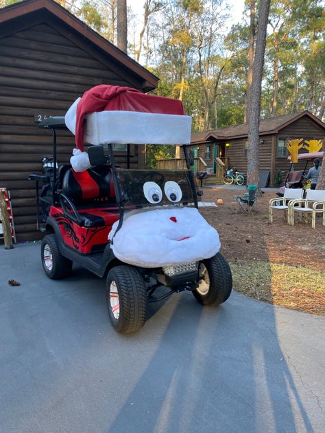 A golf cart transformed into Santa Clause for the holiday season! Golf Cart Decorated For Christmas, Golf Cart Decorating Ideas Police Car, Golf Cart Xmas Decorations, Christmas Decorated Golf Cart Ideas, Golf Cart Decorations For Christmas, Golf Cart Christmas Decorations, Christmas Golf Cart Decorating Ideas, Christmas Golf Cart Parade Ideas Easy, Decorate Golf Cart For Christmas