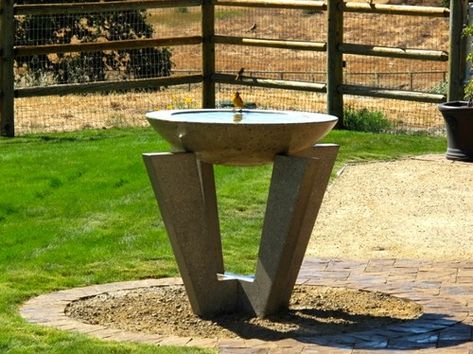 This cool design almost looks like a statue in itself. At first glance, it probably even looks like some sort of modern fire pit, but it’s quite the opposite. This is a bird bath that demands attention and this concept would look great in a wide open garden so that this bird bath gets the attention it deserves. The modern design includes sleek, flat columns along the sides that support the marble bowl in the middle. Quite an interesting concept. Bird Bath Ideas Front Yards, Small Garden Decoration, Bamboo Garden Fence, Modern Bird Baths, Birdbath Ideas, Unique Bird Baths, Large Bird Baths, Bamboo Garden Fences, Metal Bird Bath