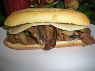 Philly Cheese Steak Sandwiches Slow Cooker Philly Cheese Steak, Philly Steak Sandwich, Beef Round Steak, Philly Cheese Steak Sandwich, Cheesesteak Sliders, Philly Cheese Steak Sliders, Steak Sandwiches, Philly Steak, On A Bun