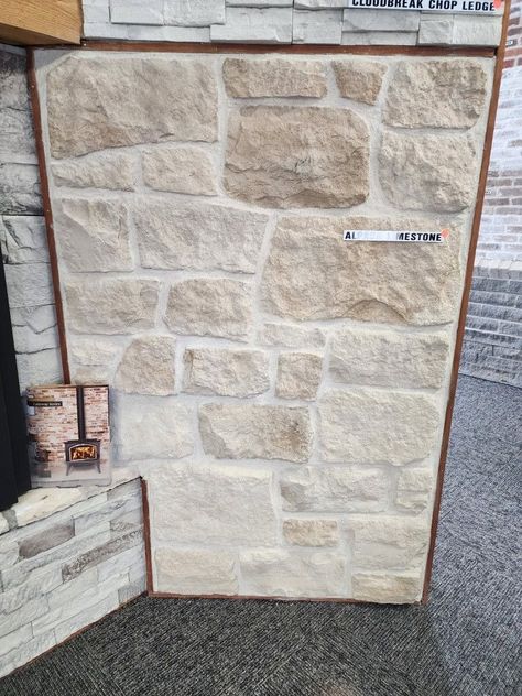 Interior Limestone Wall, Tapered Stone Fireplace, Stone Wall Master Bed, Stone Tile For Fireplace, Veneer Stone Fireplace, Stone And White Exterior, Limewash Range Hood, Stone Wall Dining Room, Sand Stone Fireplace