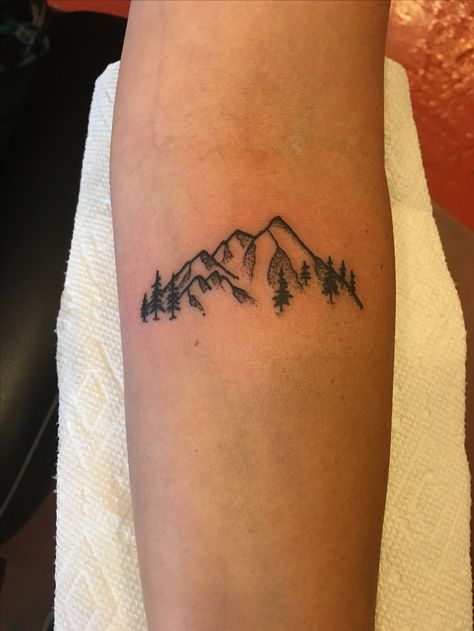 Little mountains tattoo  #boulderinn Alpine Mountain Tattoo, Small Mountain Tattoos For Women Forearm, Tattoo Daughter, Moutain Tattoos, Sister Tats, Small Mountain Tattoo, Berg Tattoo, Outdoor Tattoo, Mountain Tattoos