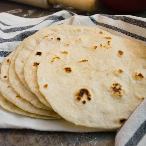 Homemade flour tortillas are a great base to your burritos, tacos, enchiladas, wraps and more! Include these soft flour tortillas in your next dinner to create the perfect homemade fiesta or 'Taco Tuesday'! This quick and easy-to-follow recipe uses simple ingredients so fresh tortillas are always possible. Soft Flour Tortillas, Homemade Flour, Fresh Tortillas, Homemade Flour Tortillas, Tortilla Recipe, So Fresh, Flour Tortillas, Taco Tuesday, Tortillas