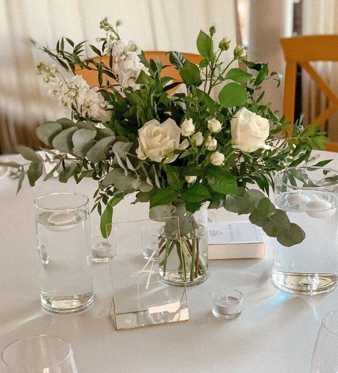 Greenery Round Table Decor, Mostly Greenery Centerpieces, Elegant Simple Centerpieces, Gardenia Wedding Centerpieces, Floral Arrangements For Round Tables, Green Wedding Centerpieces Round Table, White And Green Wedding Flowers Table Centerpieces, Sage Centerpieces Wedding, Round Table Centerpieces Wedding Simple Floral Arrangements