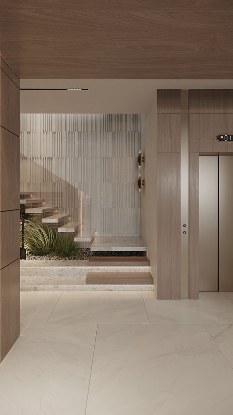 Two Light and Luxurious Living Spaces With Wow Factor Stair Wall Design, Lift Wall, Lift Lobby Design, Luxury Stairs, Elegant Villa, Staircase Design Modern, Lift Lobby, Stair Wall, Staircase Wall