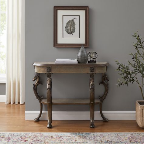 Grey wash finish over earthy brown wood tones lend to a traditional aesthetic. Pewter coating offers a beautiful muted texture on the cast iron legs. 4 cast iron legs with horse heads and hooves support the structure. Linon Farmhouse Greywash Console Table in Gray | PLWS759 Cast Iron Legs, Horse Heads, Pewter Grey, Grey Flooring, Universal Furniture, Led Floor Lamp, Furniture Deals, Grey Wash, Wooden Shelves