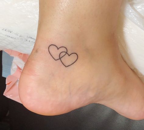 Two hearts tattoo #heart #hearttattoo #tinytattoo #smalltat #ankletattoo #tattoo #bestfriendtattoo Two Hearts Tattoo, Hart Tattoo, Heart Tattoo Ankle, Little Heart Tattoos, Hearts Tattoo, Tiny Heart Tattoos, Ankle Tattoo Designs, Small Heart Tattoos, Tattoo Heart