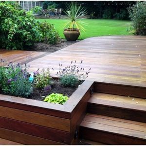 This post explores lots of different ideas for what your garden deck could look like - from classic wood finishes to bright colour and quirky ideas! Composite Decking Designs, Patio Deck Designs, Wooden Deck, Deck Designs Backyard, Decks Backyard, Diy Deck, Backyard Deck, Deck Garden, Deck Ideas