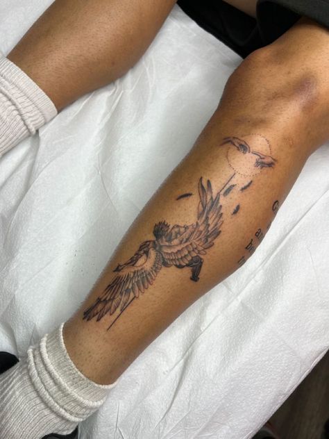 Tattoo Art Pieces, Namesake Tattoos, Creative Men’s Tattoos, Side Of Shin Tattoo, Men’s Shin Tattoo Ideas, Angel Shin Tattoo, Angel Tattoo Men Leg, Patchwork Tattoo Ideas Legs Men, Leg Tattoos Angel