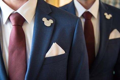 Mickey Mouse pins adding a stylish touch to these groom's suits. Mickey Mouse Wedding Ideas, Disney Wedding Dress, Disney Wedding Ideas, Mickey Wedding, Grooms Suits, Mickey Mouse Wedding, Wedding Magical, Fairytale Wedding Theme, Wedding Disney