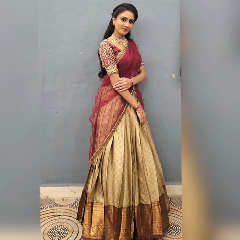 Half saree lehenga with hand embroidery work By #dharyadesignerstudio #halfsaree #lehenga #handembroidery Dhavani Half Saree Color Combos, Gold Half Saree, Mehendi Function, Hand Embroidery Work, Half Saree Lehenga, Saree Lehenga, Saree Poses, Half Saree Designs, Heart Wallpaper