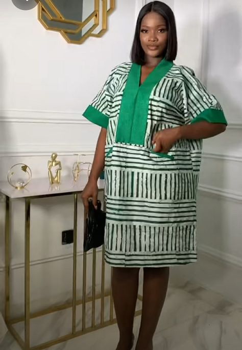 Beautiful short Agbada dress. Short Agbada For Women, Latest Agbada Styles For Women, Ankara Bubu Gown Styles For Women Long, Adire Short Gown Styles, Agbada Styles For Women, Ankara Designs For Ladies, Ankara Bubu Gown Styles, Striped Kurta, Nigerian Lace Dress