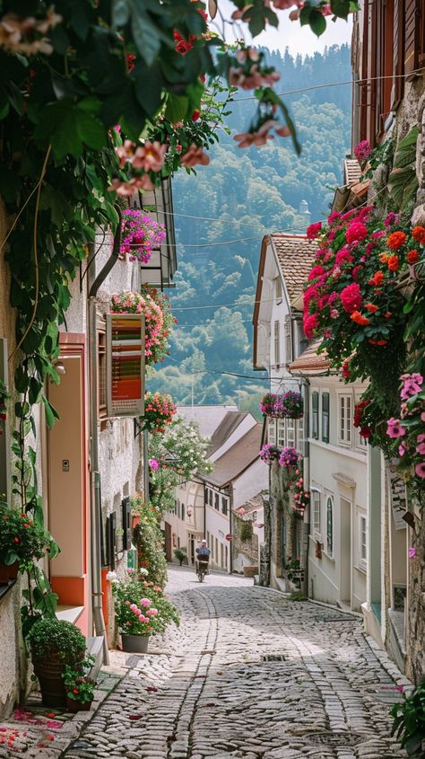 Charming Cobblestone Street: A charming #cobblestone street lined with #floweringplants in a quaint #village surrounded by lush green #hills. #tranquil #picturesque #aiart #aiphoto #stockcake ⬇️ Download and 📝 Prompt 👉 https://stockcake.com/i/charming-cobblestone-street_1151281_836915 Street View Aesthetic, Cozy Village, Cute Town, Cobblestone Street, Shop Painting, Property Ideas, Street Image, Cobbled Streets, Antique Wall Decor