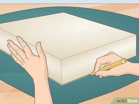 How to Sew Bench Cushions (with Pictures) - wikiHow How To Make Cushions For Patio Furniture, Diy Outdoor Bench Cushion, How To Make A Bench Cushion, Sewing Cushion Covers, Diy Couch Cushions, Diy Bench Cushion, Bench Cushion Cover, Pattern Bank, Corner Piece