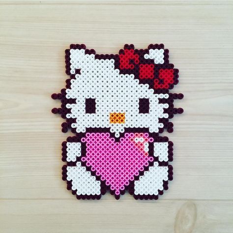 KawaiiBox.com ❤ The Cutest Subscription Box — Get inspired by Kittybeads and make your own Hello... Kitty Perler Beads, Melt Beads Patterns, Hamma Beads Ideas, Melty Bead Patterns, Easy Perler Beads Ideas, Fuse Bead Patterns, Art Perle, Hama Beads Design, Perler Bead Templates