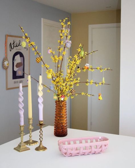 A Danish Home With Easter Touches Danish Living Room, Danish Home, 1970s House, Twisted Candles, Spring Trees, My Scandinavian Home, Pastel House, Spring Tree, Colored Glassware