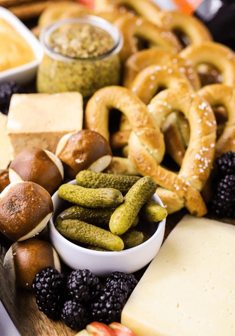 Oktoberfest Charcuterie Board - Simply Made Recipes Board Meeting Food Ideas, Oktoberfest Snack Board, German Charcuterie Board Ideas, Octoberfest Charcuterie Board, Polish Charcuterie Board, October Fest Charcuterie Board, Oktoberfest Charcuterie Board, German Charcuterie Board, Oktoberfest Charcuterie