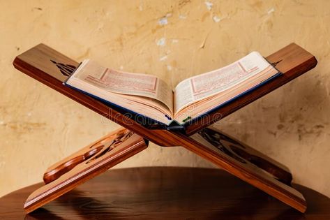 Quran on rihal/rehal or carved wood book stand. In an artistic rural room. It is #Sponsored , #ad, #paid, #rehal, #Quran, #wood, #carved Rehal Quran, Background Event, Wood Book Stand, Event Concept, Book Stand, Wood Book, Book Stands, Wood Carved, Website Design Inspiration