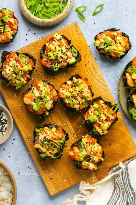 Enjoying sushi at home has never been easier than with these Baked Salmon Sushi Cups! These bite-sized cups are easy to make, even easier to eat and full of so much flavor! Baked Salmon Seaweed Cups, Seaweed Salmon Cups, Baked Salmon Cups, Salmon Nori Cups, Sushi Bake Cups Recipe, Smoked Salmon Sushi Bowls, Sushi Salmon Bake, Salmon Sushi Bites, Sushi Bakes