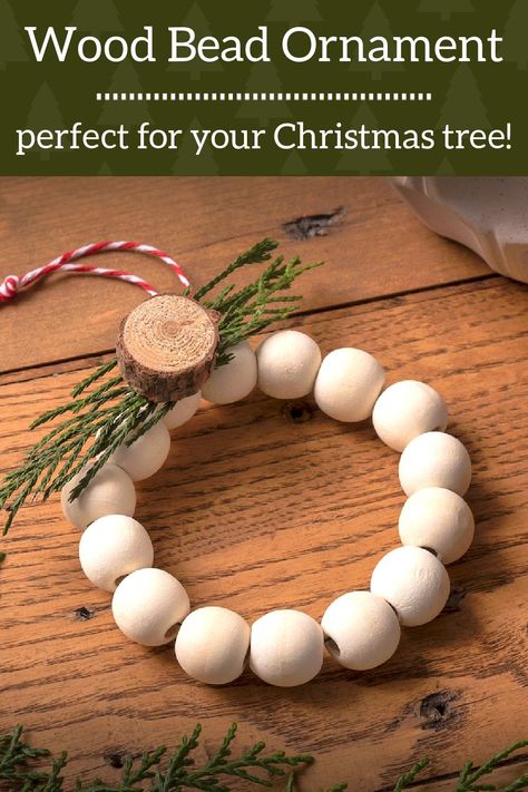 Learn how to make a wood bead ornament that looks beautiful on your Christmas tree! You can make this holiday craft in four simple steps. Beginner Crafts, Christmas Craft Projects, Crochet Christmas Decorations, Mini Wreaths, Crochet Ornaments, Holiday Craft, Beaded Christmas Ornaments, Festival Diy, Wood Bead Garland