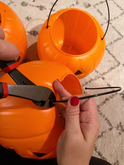 How I Used Plastic Pumpkins to Decorate a Porch - traditionallycozy.com Small Plastic Pumpkin Crafts, How To Decorate A Plastic Pumpkin, Decorating With Plastic Pumpkins, Plastic Pumpkin Bucket Crafts, Plastic Pumpkin Ideas, Diy Plastic Pumpkin Ideas, Plastic Pumpkin Decorating Ideas, Plastic Pumpkins Makeover, Pumpkin Bucket Crafts