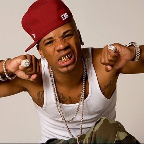 Plies was born Algernod Lanier Washington in Fort Myers, Florida in July 1976. In high school Plies was Homecoming King as well as being named best dressed and playing on the football team. He played wide receiver at Miami University from 1995 to 1997. Plies and his stepbrother started a record label called Big Gates Records. Plies landed a deal with Slip-n-Slide Records and released several mixtapes. In 2007 his first album The Real Testament was released. He had hits with the singles "Shaw... Plies Rapper, Homecoming King, Marley Twist Hairstyles, Fashion Education, Lil Boosie, Slip N Slide, Miami University, Richest Celebrities, Marley Twists