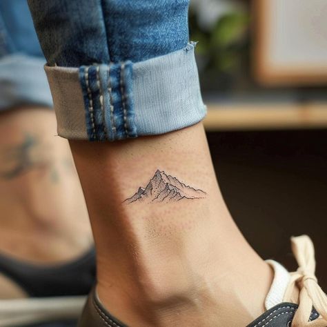 Mountain Symbol Tattoo, Ankle Mountain Tattoo, The Climb Tattoo, Adventure Tattoos Women, Nepal Tattoo Ideas, Mountain Tattoo Minimalist, Montagne Tattoo, Mountain Line Tattoo, Alaskan Tattoos