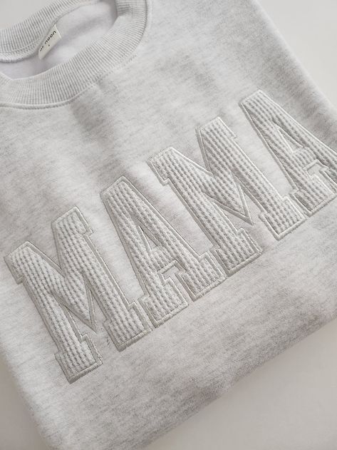 At Noon Exclusive, Made in South Korea with LOVE - Oversized sweatshirt in warm brushed cotton ( matching sweatshirts for minis sold separately)- 100% Cotton- Waffle embroidered letter patch- Rib-knit cuff, hem and necklineModel: 5'5.7" and 125 lbs wearing size S SizeS: 4-6, M: 8-10, L:10-12CareMachine wash cold with like colors.Do not Bleach. Hang dry to avoid shrinkingCool iron if needed. Do not dry clean.* Mama sweatshirts may shrink up to a full size after first wash Mama Applique Sweatshirt, Machine Embroidery Sweatshirt Ideas, Mama And Mini Sweatshirts, Iron On Patches Sweatshirt Ideas, Embroidered Sweatshirt Outfit, Embroidered Sweatshirt Ideas, Patch Sweatshirt Diy, Hand Embroidery Sweatshirt, Making Sweatshirts