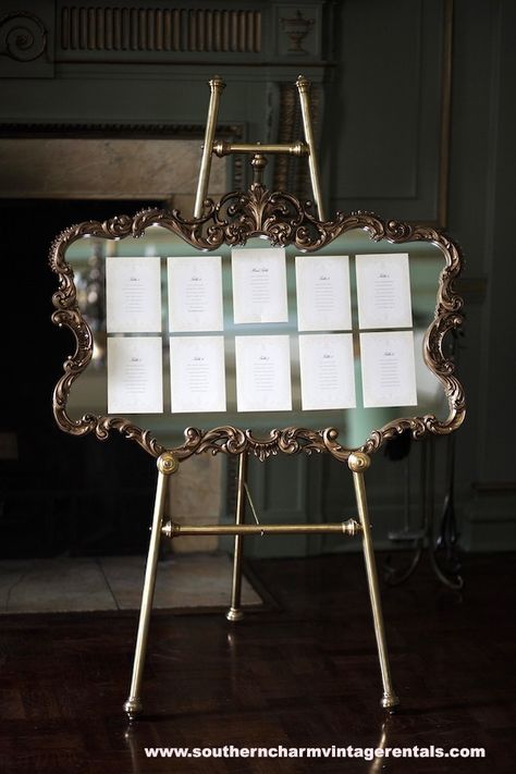 Elegant Seating Chart. French Gold Mirror and brass easel by www.southerncharmvintagerentals.com Ferris Wheel Press - Stationery Mirror Wedding Decor, Welcome Chart, Gold Mirror Wedding, Easel Mirror, Elegant Seating Chart, Ferris Wheel Press, Vintage Gold Mirror, French Chateau Wedding, Boho Mirror