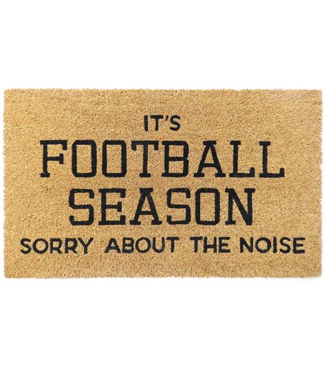 Get Ready for Fall Football Season with the 30" x 18" Coir Doormat by Place & Time Welcome your guests in style with the Fall Football Season Coir Doormat by Place & Time Made of natural coir and rubber latex, this doormat is biodegradable The mat is suitable for indoor or covered outdoor use and measures 30" x 18" x 059" Cleaning the doormat is easy and hassle - free Simply use a vacuum cleaner to remove any dirt or debris To maintain the pile surface, shake or brush the mat regularly Shedding may occur for the first few months as this is a natural product Allow the mat to dry naturally and thoroughly after use Do not soak the mat or re - lay it when wet Care should be taken when using this mat on polished or shiny surfaces as certain types of flooring can be discolored when covered Produ Fall Football Doormat, Fall Football Decor, Football Home Decor, Fall Reads, Football Decor, Porch Sitting, Get Ready For Fall, Fall Football, Football Sunday