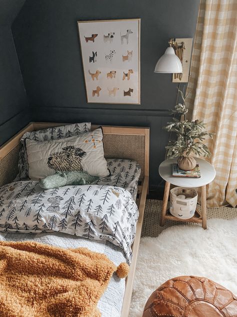 Shared Guest Room And Nursery, Toddler Boy Bedroom Gray Furniture, Toddler Room Wallpaper Boy, Little Boy Bedding, Moody Toddler Boy Room, Calming Boys Bedroom, Small Bedroom Toy Storage Ideas, Toddler Room Themes Boy, Toddler Boy Room Colors Schemes