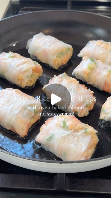 Ariel Laing on Instagram: "Crispy Rice Paper Rolls with sushi rice, spicy mayo, scallions, and baked salmon! No joke, these are making weekly appearances in my kitchen for lunch!  Ingredients: → Sushi rice → Kewpie Mayo → Sriracha → Scallions → Salmon → Seaweed squares → Rice paper → Neutral oil  Can’t wait to see which leftovers I throw in there next week. 😂🙌🏻  #ricepaper #sushi #salmon #salmonrecipe #easyrecipes #spicymayo #lunchideas #pescatarian #seaweed" Rice Paper Sushi Rolls Fried, Salmon Crispy Rice Paper Rolls, Crab Rangoon Rice Paper, Shrimp Rice Wraps, Smoked Salmon Spring Rolls, Salmon In Rice Paper, Crispy Salmon Rice Paper Rolls, Salmon Rice Paper Bites, Crab Rangoon Crispy Rice Sushi Cups