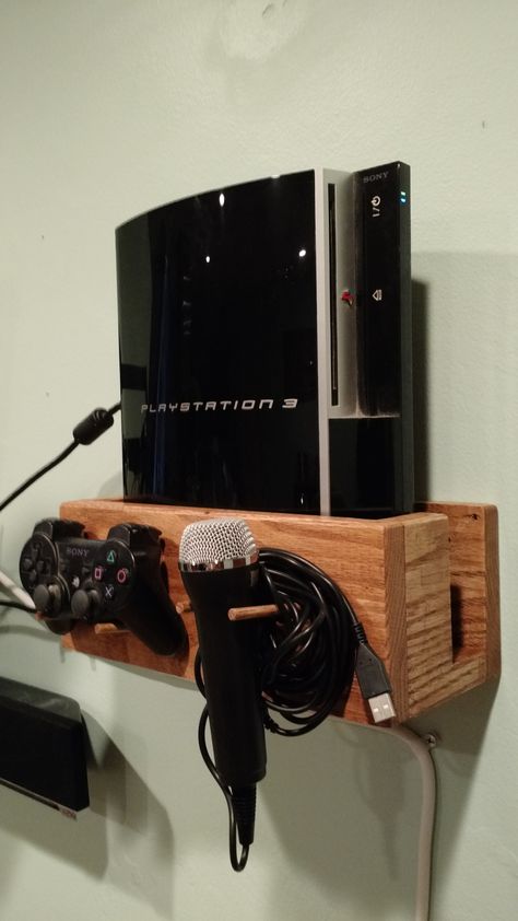 HandMade Wooden Storage for PS3 | Make your own #woodworkingprojects with Over 16000 #woodworkingplans at http://TheWoodworkingResource.co.nf Baby Proof Tv Stand, Baby Proof Tv, Diy Tv Mounting, Home Office Furniture Design, Oak Wall Shelves, Tv Mounting, Pocket Hole Joinery, Baby Proof, Setup Gamer