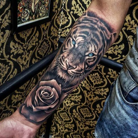 15+ Best Tiger and Rose Tattoo Designs | PetPress Tiger And Rose Tattoo, Tiger Forearm Tattoo, Mens Tiger Tattoo, Tiger Eyes Tattoo, Lion Forearm Tattoos, Tiger Tattoo Sleeve, Mangas Tattoo, Tiger Tattoos, Animal Sleeve Tattoo