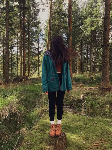 This is a picture following the granola/outdoorsy girl aesthetic. A tall, dark haired girl is standing in the woods wearing a blue and purple vintage rain coat and brown hiking boots Goth Granola Girl, Granola Girl Winter Outfits, Granola Girl Winter, Iceland Packing, Outdoorsy Girl, Granola Girl Aesthetic, Wildlife Biologist, Adventure Girl, Wardrobe Upgrade