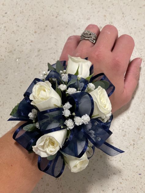 Corsage With Navy Dress, Corsage Prom Navy Blue, Navy Blue Prom Corsage, Dark Blue Corsage And Boutonniere, Prom Flowers Corsage Blue, Blue And Silver Corsage, Dark Blue Corsage, Navy Blue Corsage, Navy Corsage