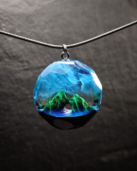 Handmade round pendant from black hornbeam wood and epoxy resin with summer mountains inside. Glow in the dark! Epoxy Resin Necklace, Summer Mountains, Wood Resin Jewelry, Mountain Jewelry, Epoxy Resin Art, Wood Necklace, Resin Necklace, Wood Resin, Crystal Art