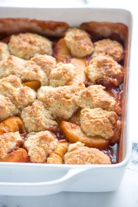 Peach Cobbler from Inspired Taste - Perfectly capture the spirit of fall with this easy recipe for peach cobbler. Spiced Peaches, Easy Peach Cobbler Recipe, Cobbler Easy, Baked Peach, Peach Cobbler Easy, Yellow Plums, Paleo Recipes Dessert, Canned Biscuits, Peach Cobbler Recipe