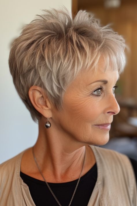 Sporting jagged layers in an edgy pixie cut is guaranteed to catch attention. If you have hair these jagged layers will add texture and volume effortlessly. Click here to check out more classic short haircuts for older women. Pixie Haircut Fine Hair, Short Spiked Hair, Chic Short Haircuts, Short Sassy Haircuts, Short Spiky Hairstyles, Short Silver Hair, Short Hair Pixie Cuts, Spiked Hair, Short Grey Hair